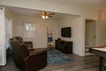 Lower Level Family Room with Electric Heating Fireplace in Entertainment Center